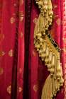 Brighton, England, United Kingdom. Red and gold fabric and tassels. Art Print
